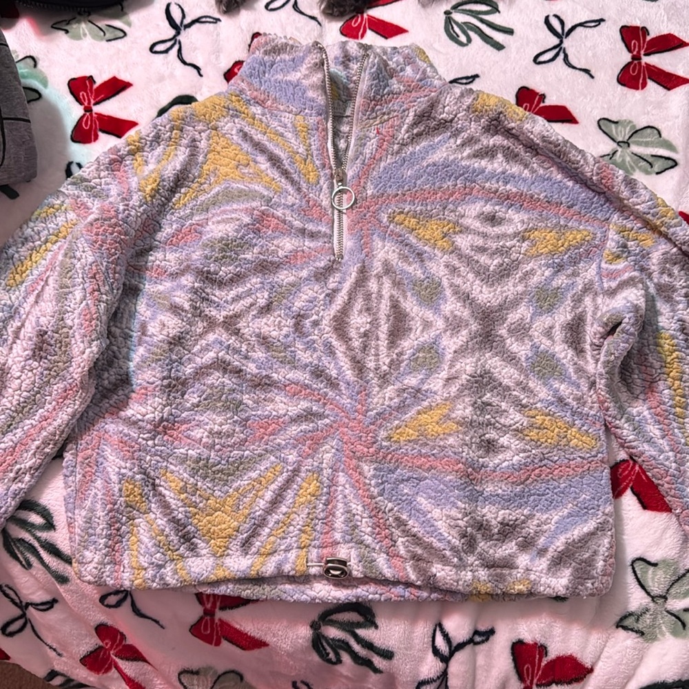 Warm and cozy sweater with an adjustable strap